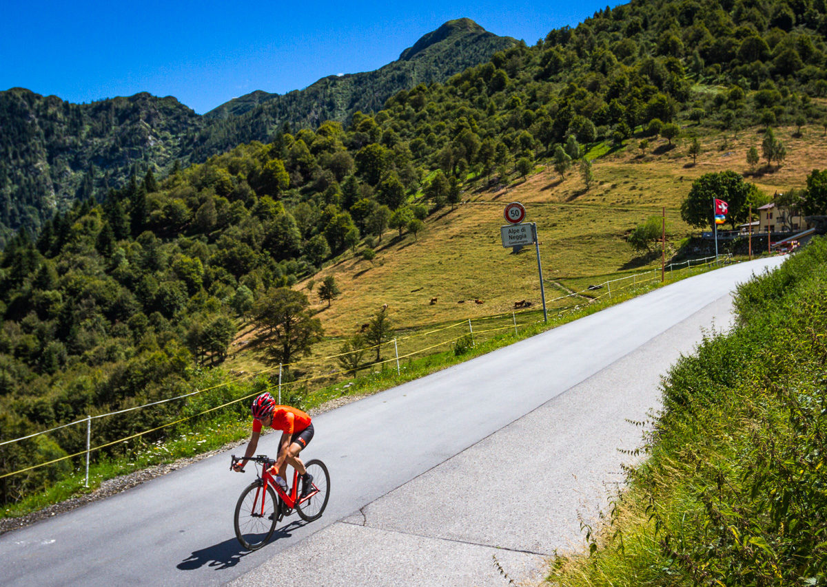 One male cyclist descending Alpe di Neggia in Ticino, Switzerland