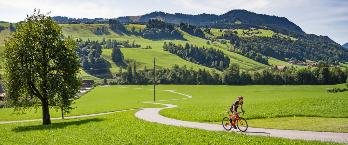 One male cyclist riding in Entlebuch, Switzerland