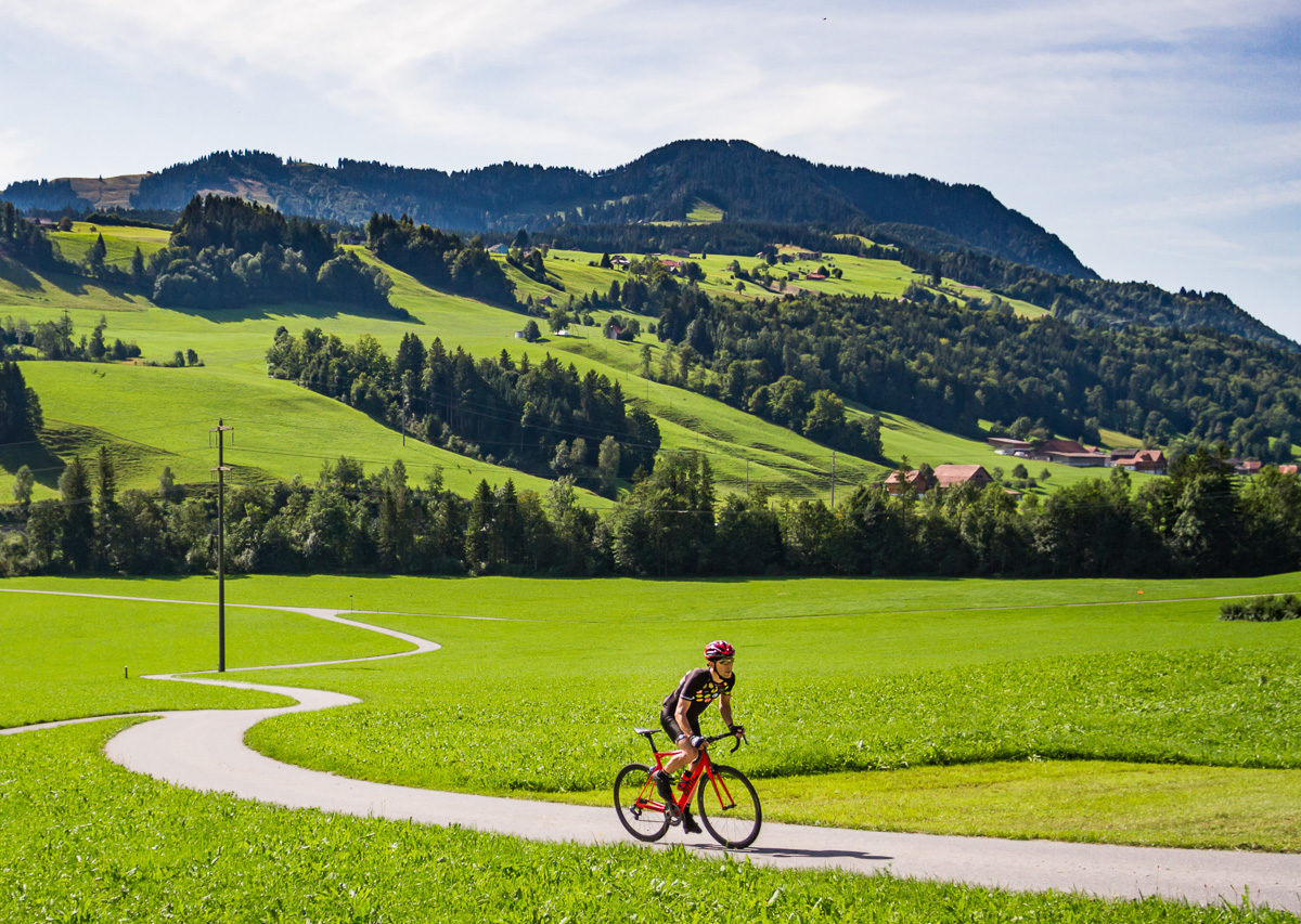 One male cyclist riding in Entlebuch, Switzerland