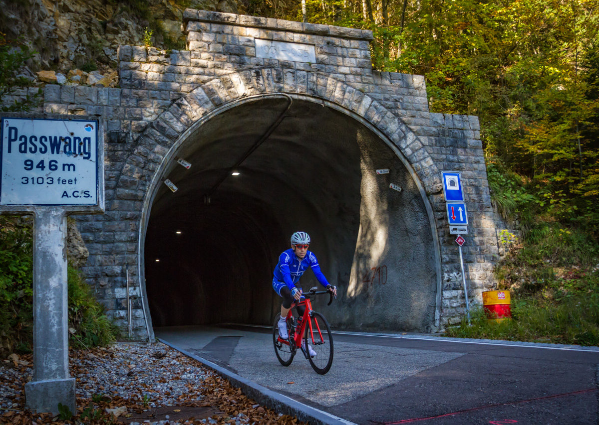 One male cyclist coming out of the Passwang tunnel in Kanton Solothurn, Switzerland