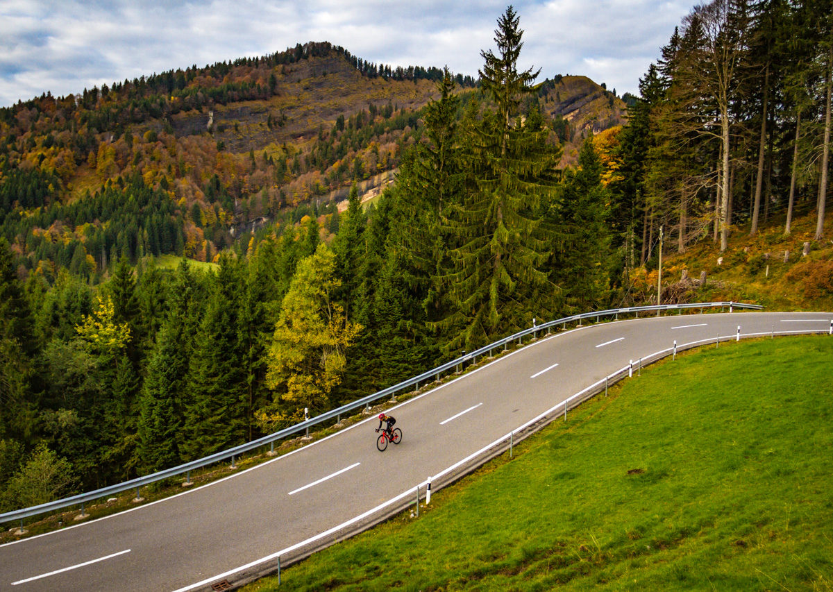 One male cyclist descending Schwägalp in Kanton Appenzell, Switzerland