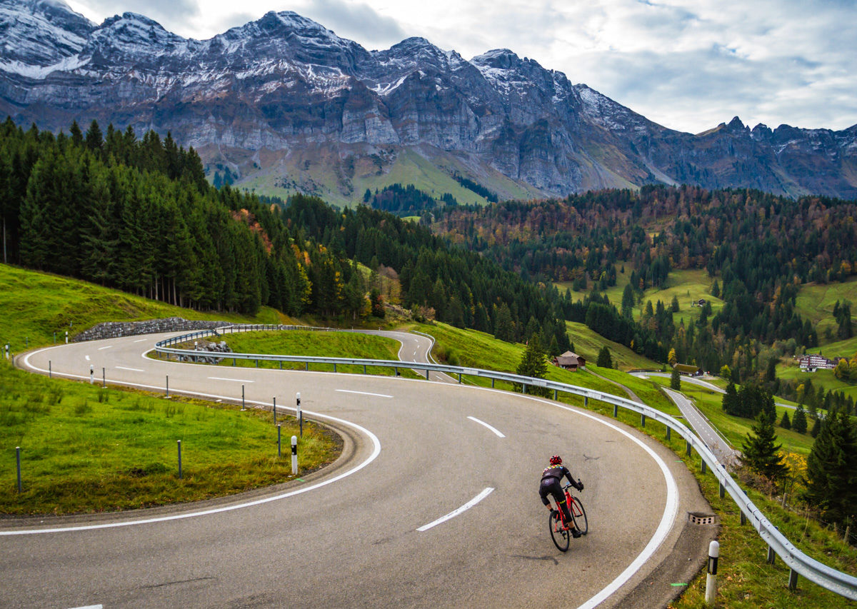 One male cyclist descending Schwägalp in Kanton Appenzell, Switzerland