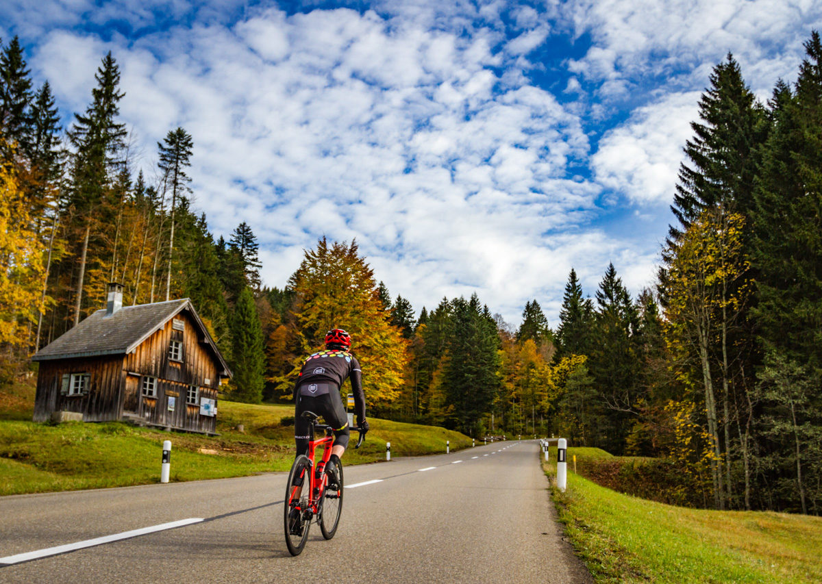 One male cyclist climbing Schwägalp in Kanton Sankt-Gallen, Switzerland