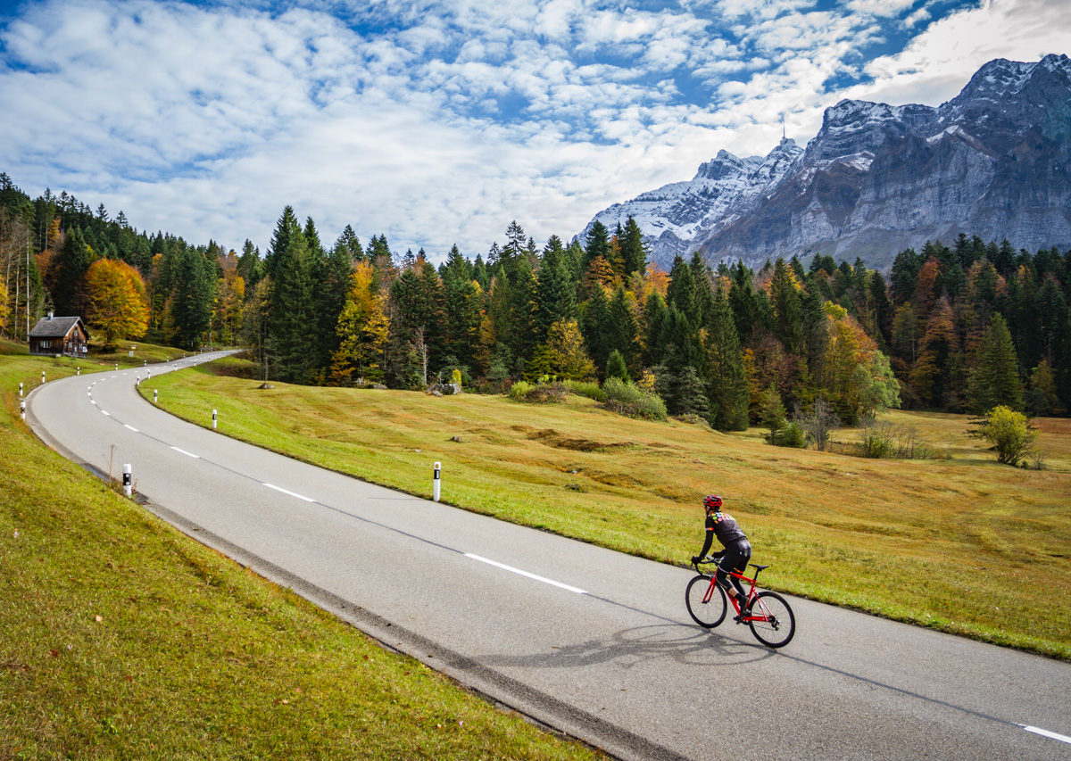One male cyclist climbing Schwägalp in Kanton Sankt-Gallen, Switzerland