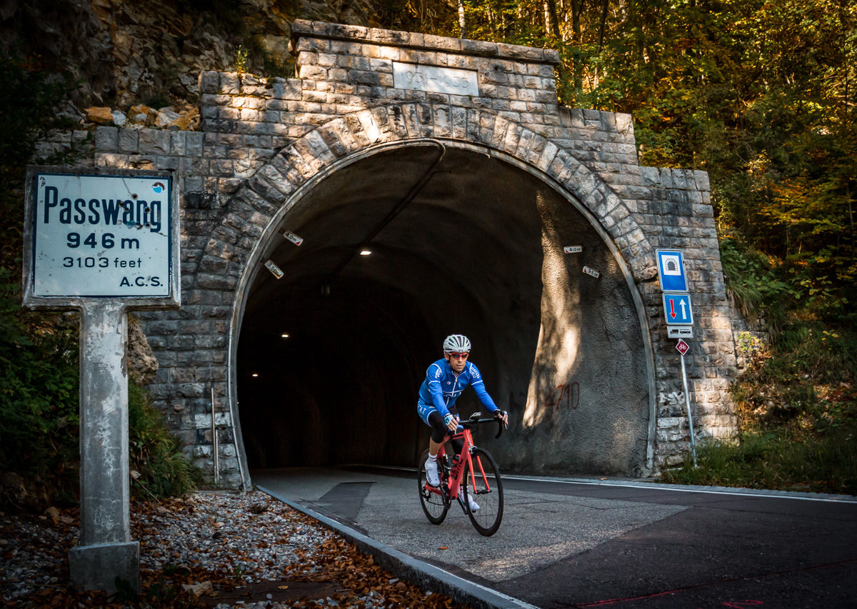 Baselbiet-0955 One male cyclist coming out of the Passwang tunnel in Kanton Solothurn, Switzerland